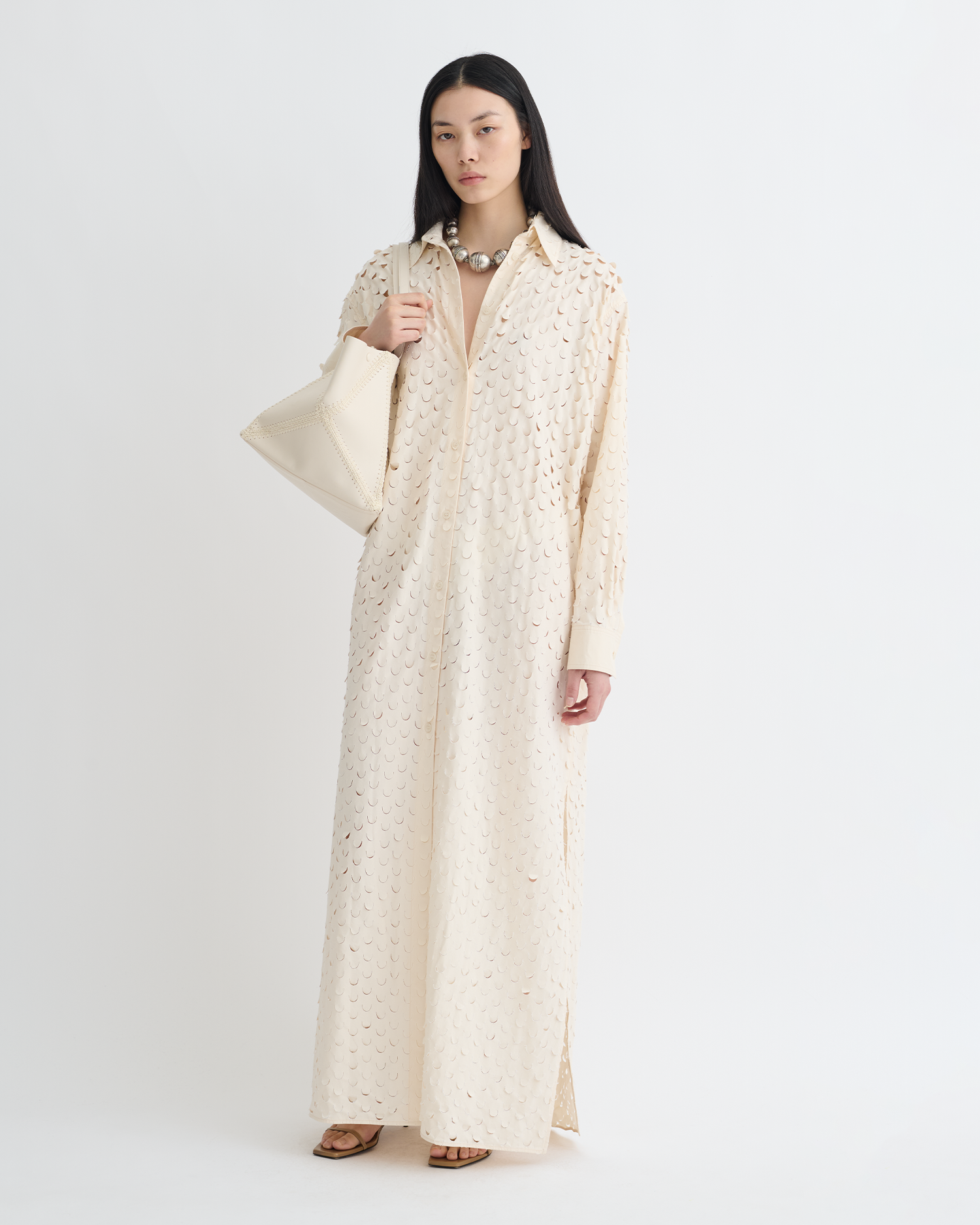 laser cut shirt dress We are crazy about this week's Pick of the Week, the laser-cut shirt dress! Wear it everywhere this season Shop the featured items in-store or online now at www.queenspark.com Shirt -